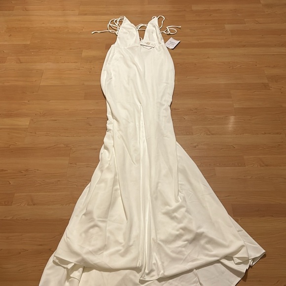 Brand new white halter gown with tie in back . Zipper in back with - Picture 12 of 15